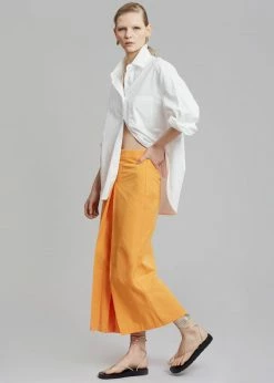Inni Didi Pleated Midi Skirt - Orange CLOTHING
